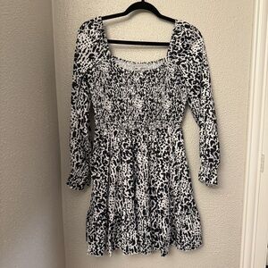 Miss Sparkling black and white leopard print dress